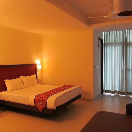 Ixora Suites Бенґалуру Номер фото
